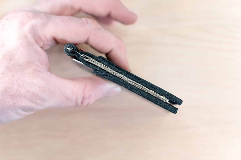 Person Holding The Thin Money Clip Person Holding The Thin Money Clip
