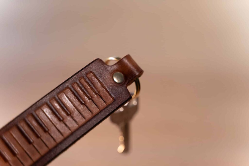 Leather-Piano-Keychain-Brass-Rivet Leather Piano Keychain Brass Rivet
