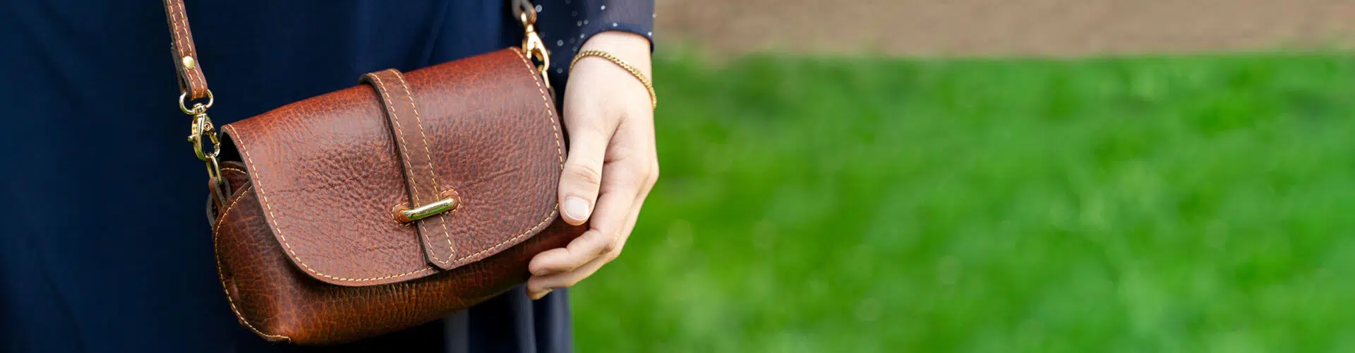 Woman wearing a Bison Leather Purse